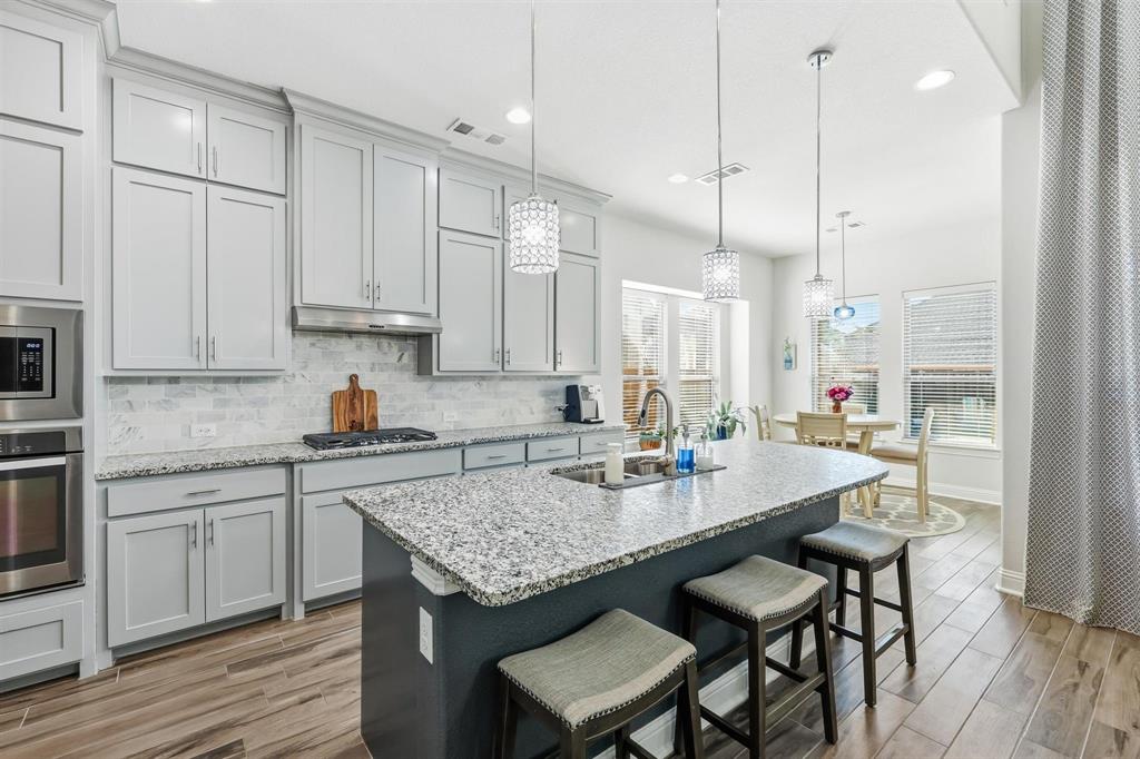 6371 Whiskerbrush Road Flower Mound, TX 76226 - Photo 4 of 38 The heart of the home!