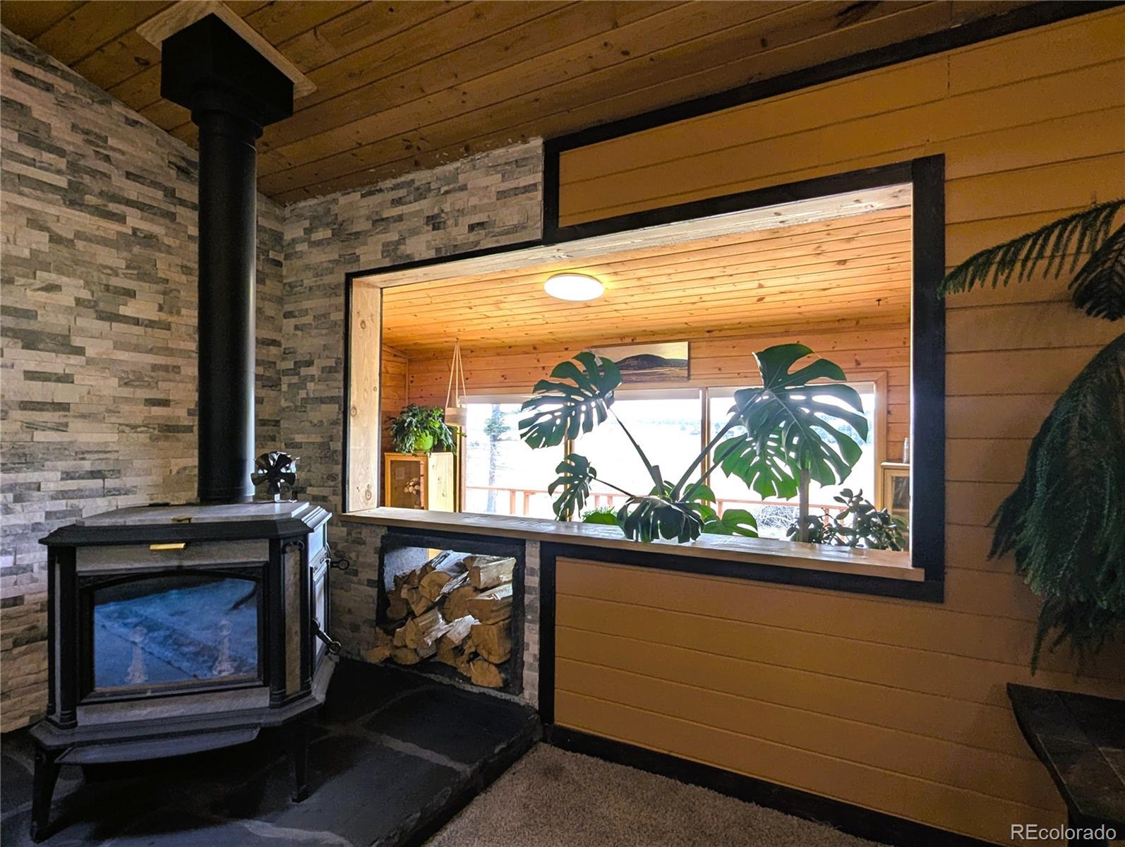 2084 Forbes Park Road Fort Garland, CO 81133 - Photo 20 of 39 a view of a fireplace in the room