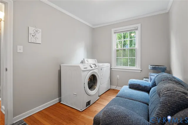 a living room with a couch and a window