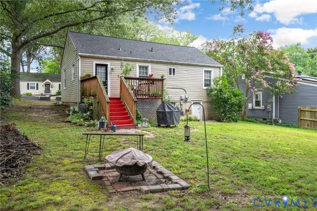 a front view of house with a garden and entertaining space