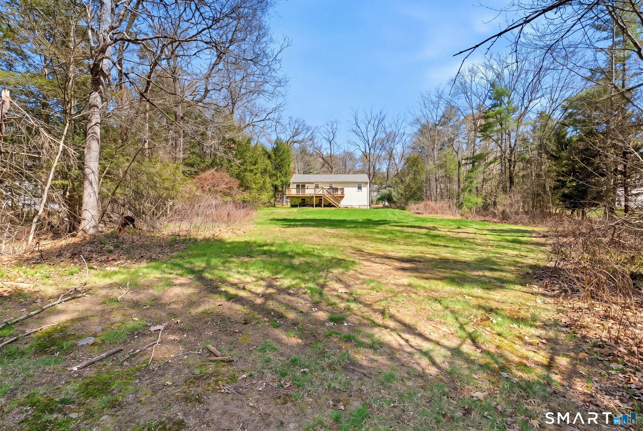 264 Quaddick Town Farm Road Thompson, CT 06277 - Photo 5 of 35 a view of a big yard with large trees