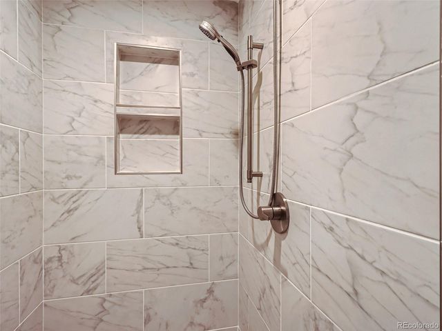 a kitchen with a stove and a sink