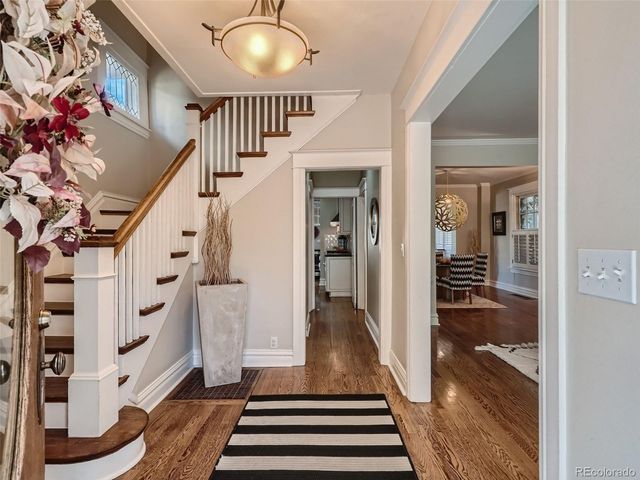 a view of a hallway with a white walls