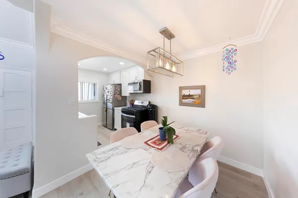 a view of a dining room with furniture
