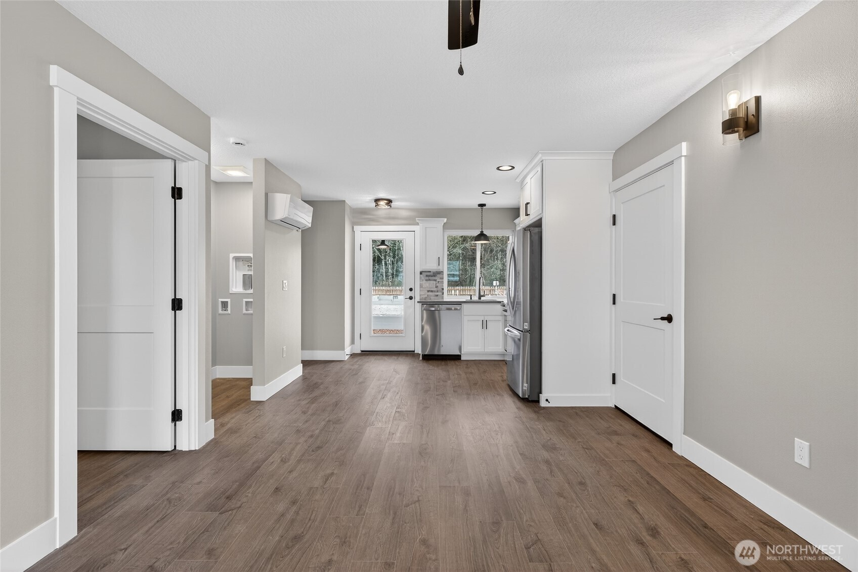 109 7th Street Southwest Long Beach, WA 98631 - Photo 15 of 22 a view of a kitchen with a refrigerator and a sink