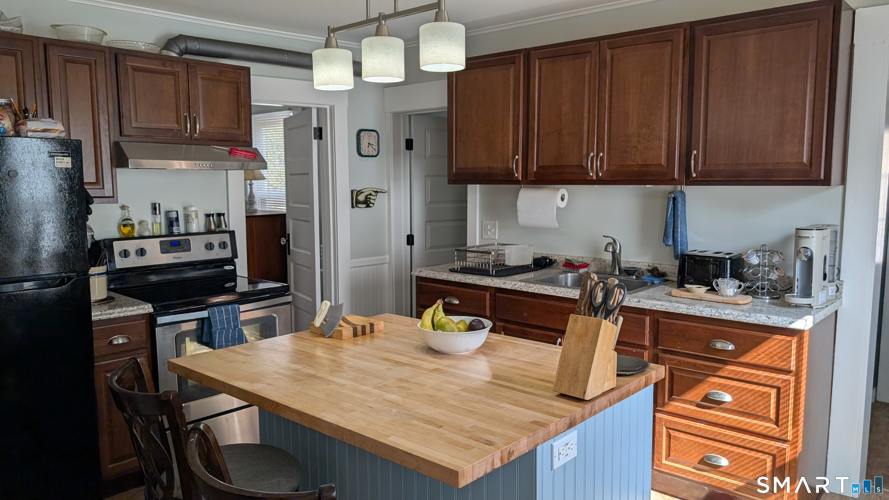45 Westbury Park Road Watertown, CT 06795 - Photo 11 of 25 a kitchen with a table chairs and refrigerator