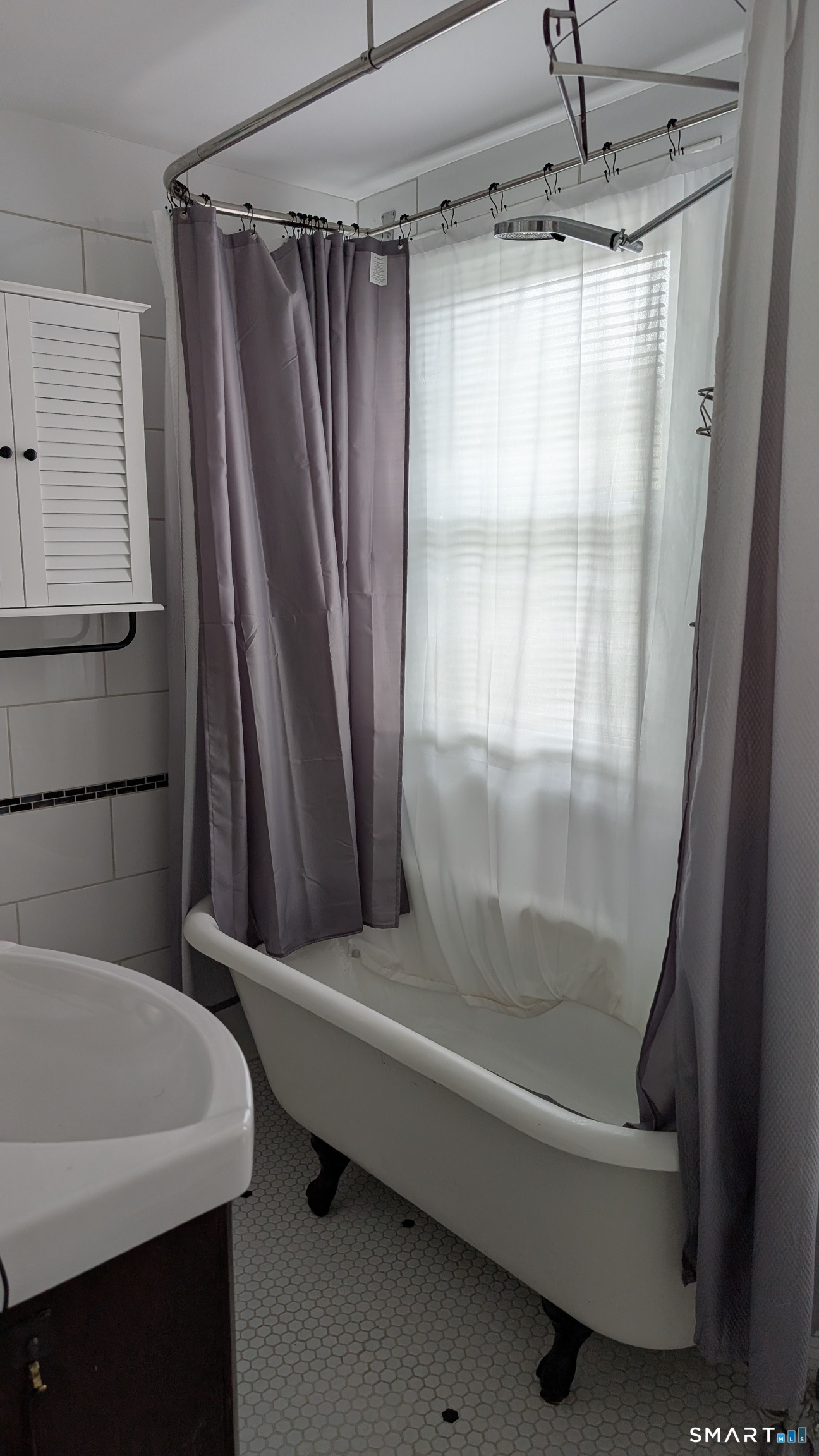 45 Westbury Park Road Watertown, CT 06795 - Photo 20 of 25 a bathroom with a shower and a tub