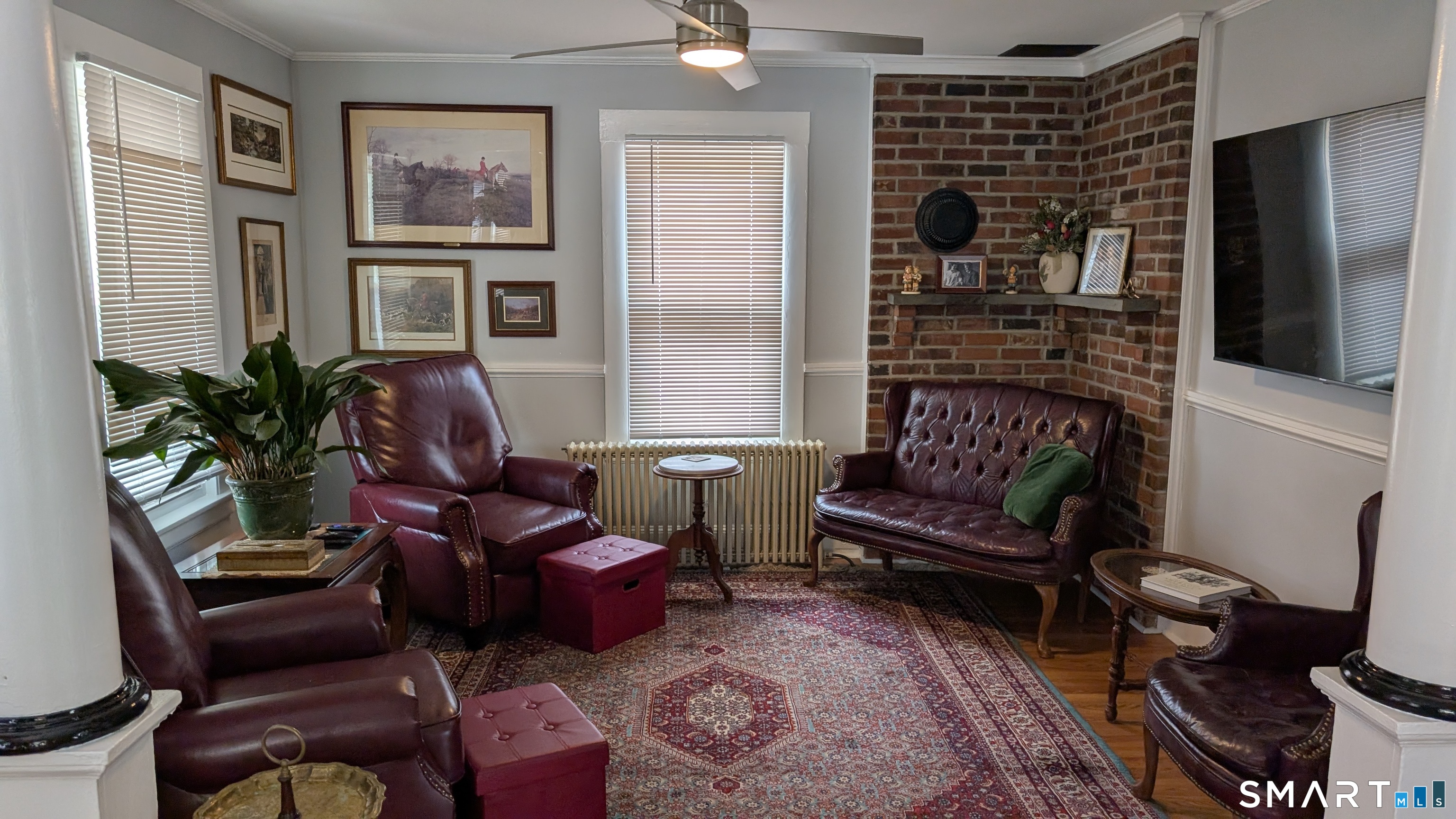 45 Westbury Park Road Watertown, CT 06795 - Photo 4 of 25 a living room with furniture and a fireplace