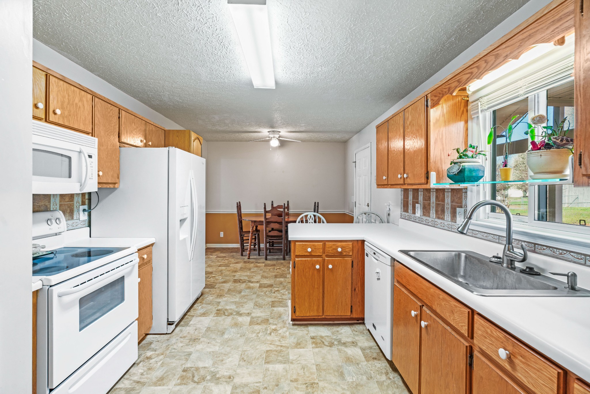 707 Spike Trail Murfreesboro, TN 37129 - Photo 21 of 64 a kitchen with stainless steel appliances granite countertop a sink stove and refrigerator