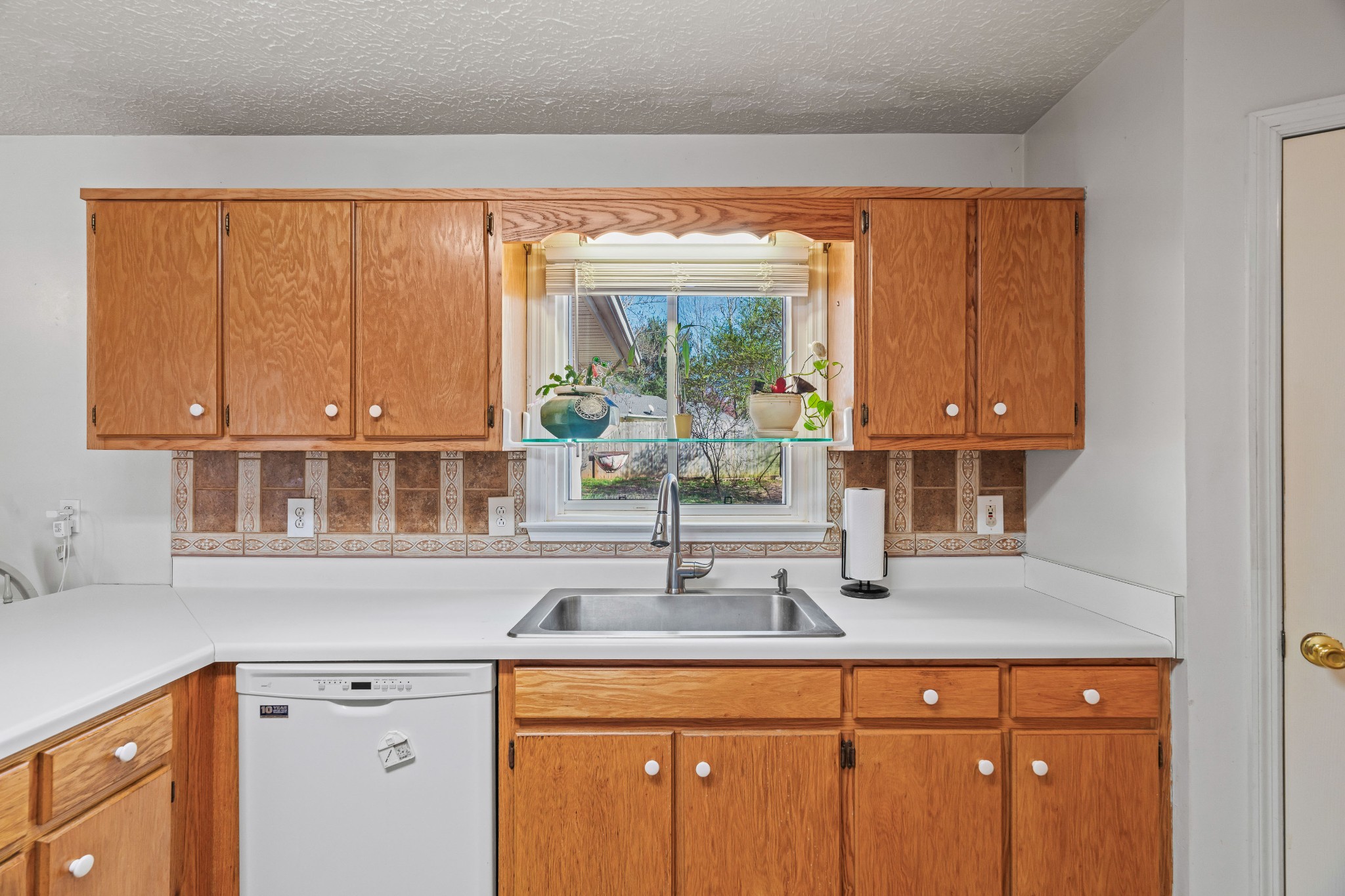 707 Spike Trail Murfreesboro, TN 37129 - Photo 23 of 64 a kitchen with a sink and a window