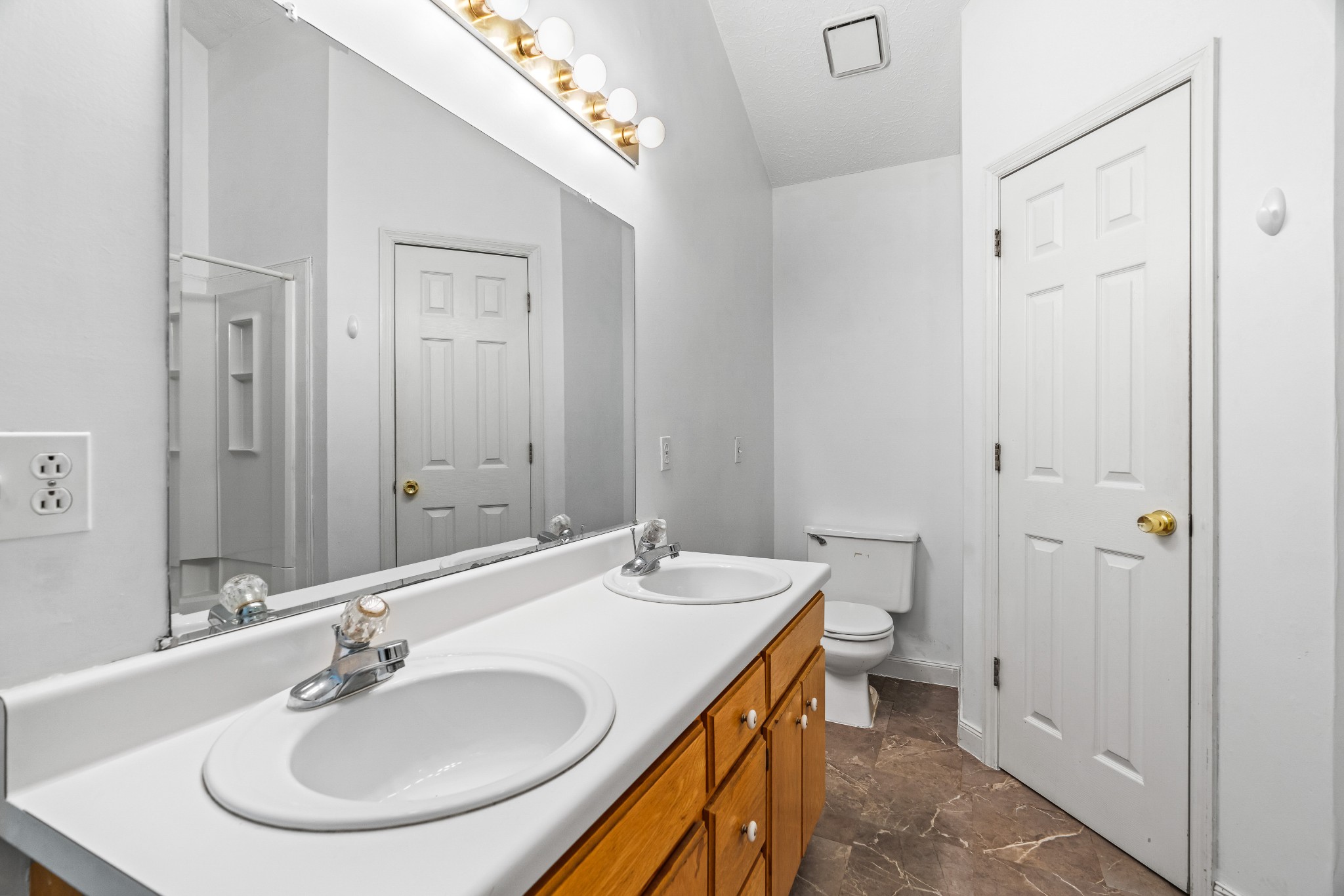 707 Spike Trail Murfreesboro, TN 37129 - Photo 29 of 64 a bathroom with a sink and a mirror
