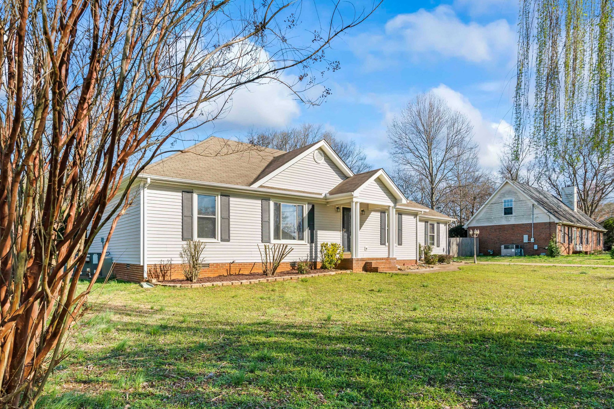 707 Spike Trail Murfreesboro, TN 37129 - Photo 3 of 64 a front view of house with yard and green space