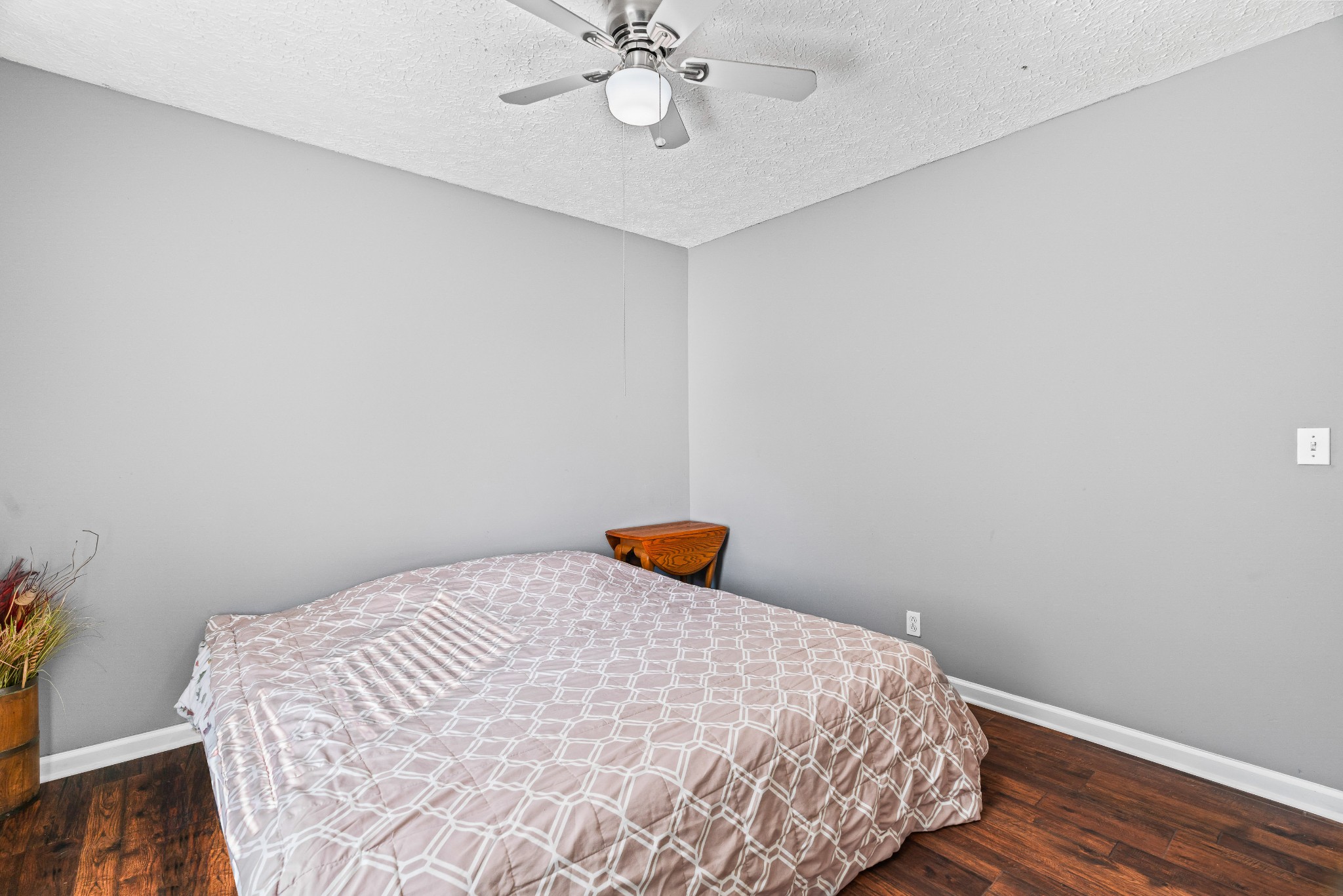 707 Spike Trail Murfreesboro, TN 37129 - Photo 36 of 64 a bedroom with a bed and wooden floor
