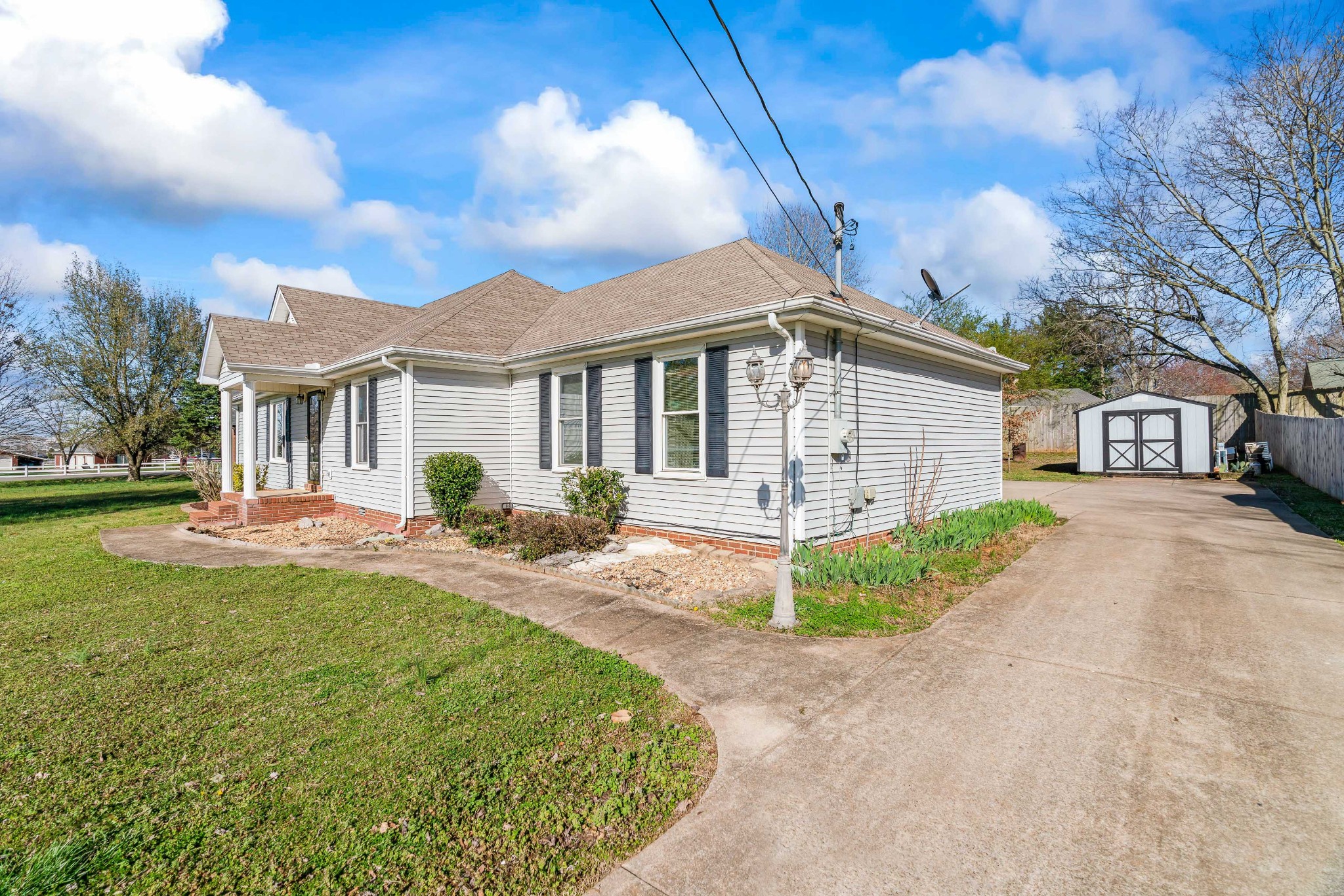 707 Spike Trail Murfreesboro, TN 37129 - Photo 49 of 64 a front view of a house with yard and green space