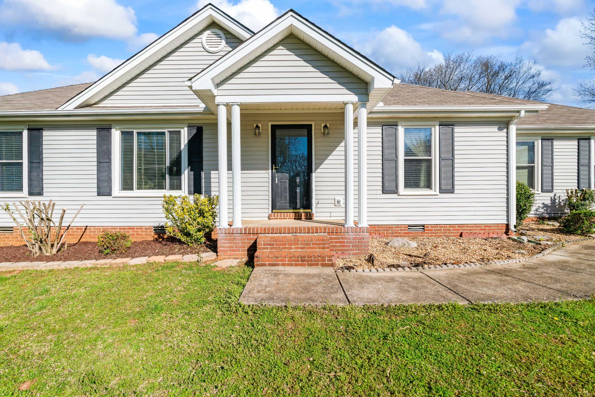 707 Spike Trail Murfreesboro, TN 37129 - Photo 53 of 64 a front view of a house with a yard