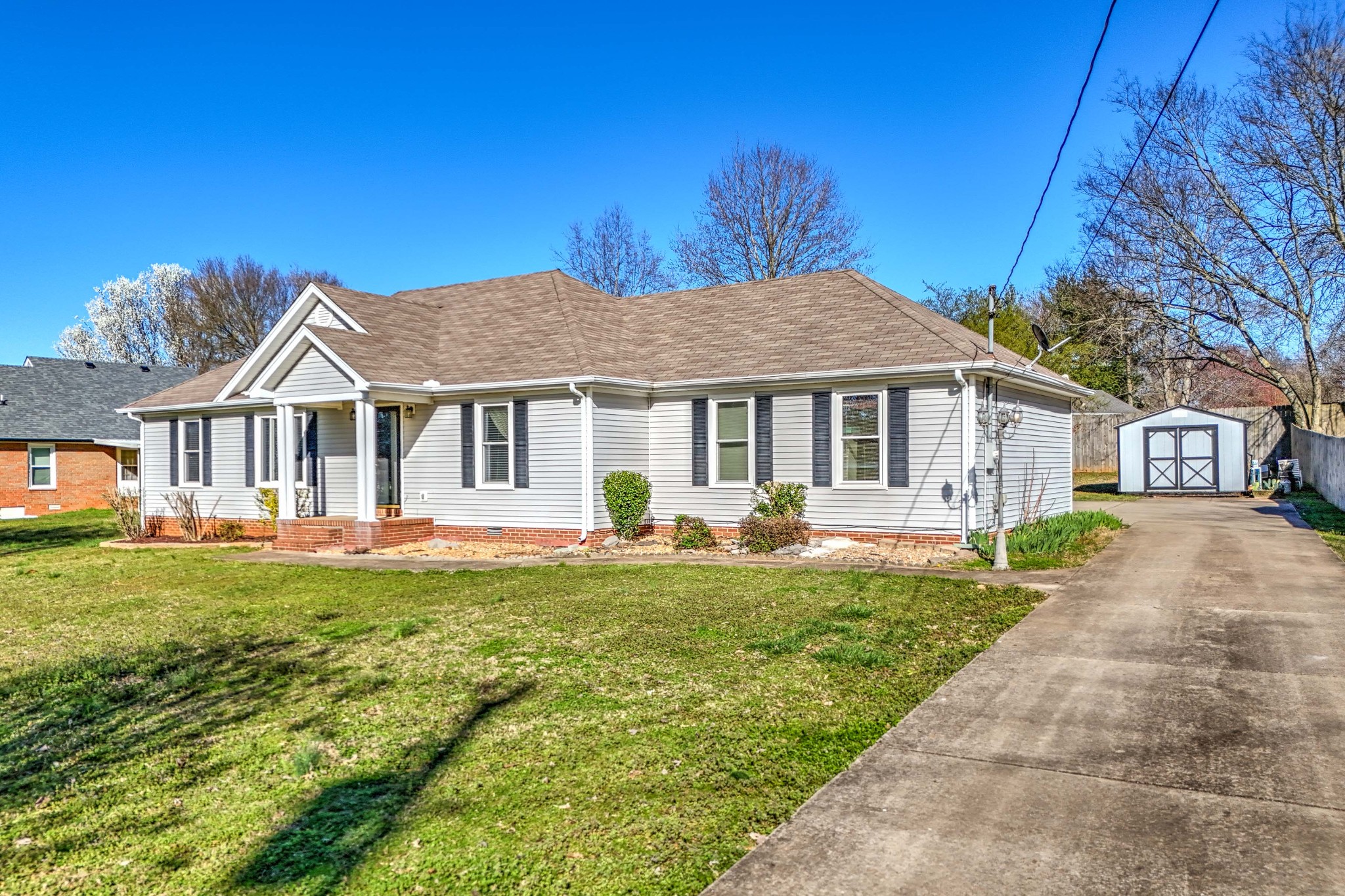 707 Spike Trail Murfreesboro, TN 37129 - Photo 57 of 64 a front view of a house with a garden