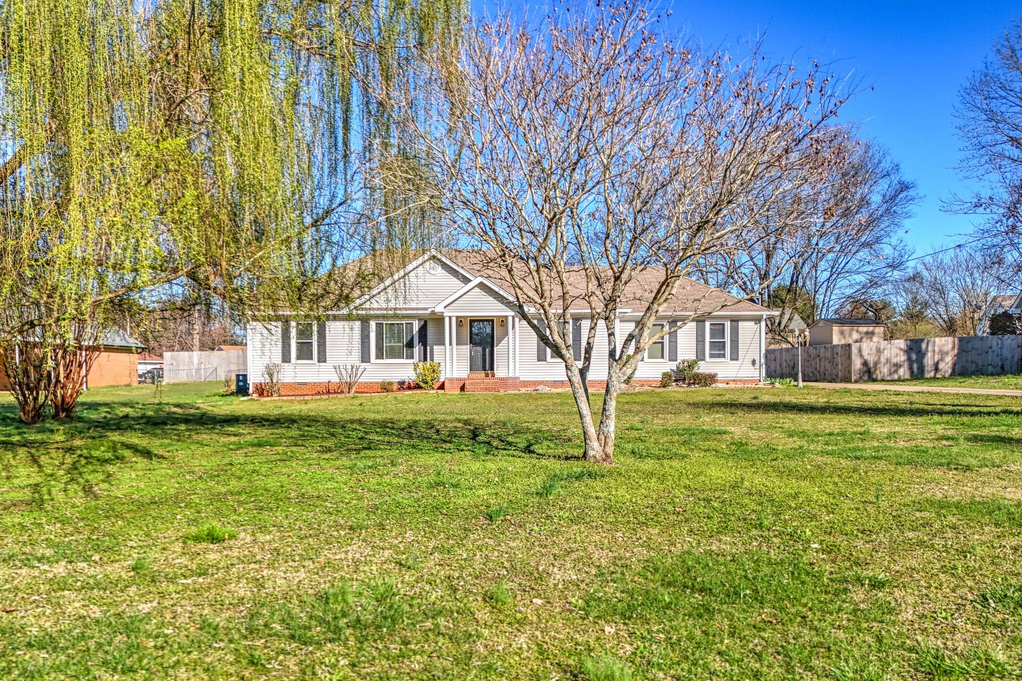 707 Spike Trail Murfreesboro, TN 37129 - Photo 58 of 64 a front view of a house with a yard