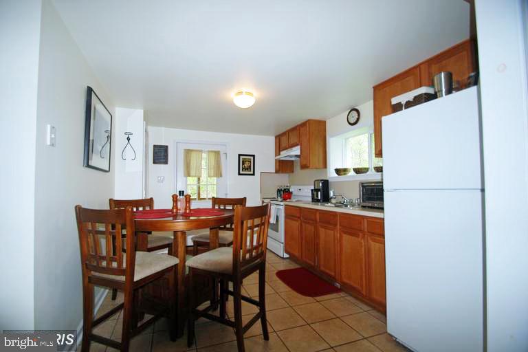 150 Marley Road Elkton, MD 21921 - Photo 3 of 7 Cozy kitchen with warm wood accents.
