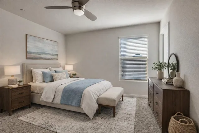 a bedroom with bed and a window