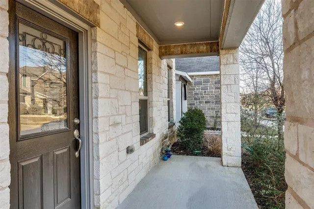 a view of a brick house with windows