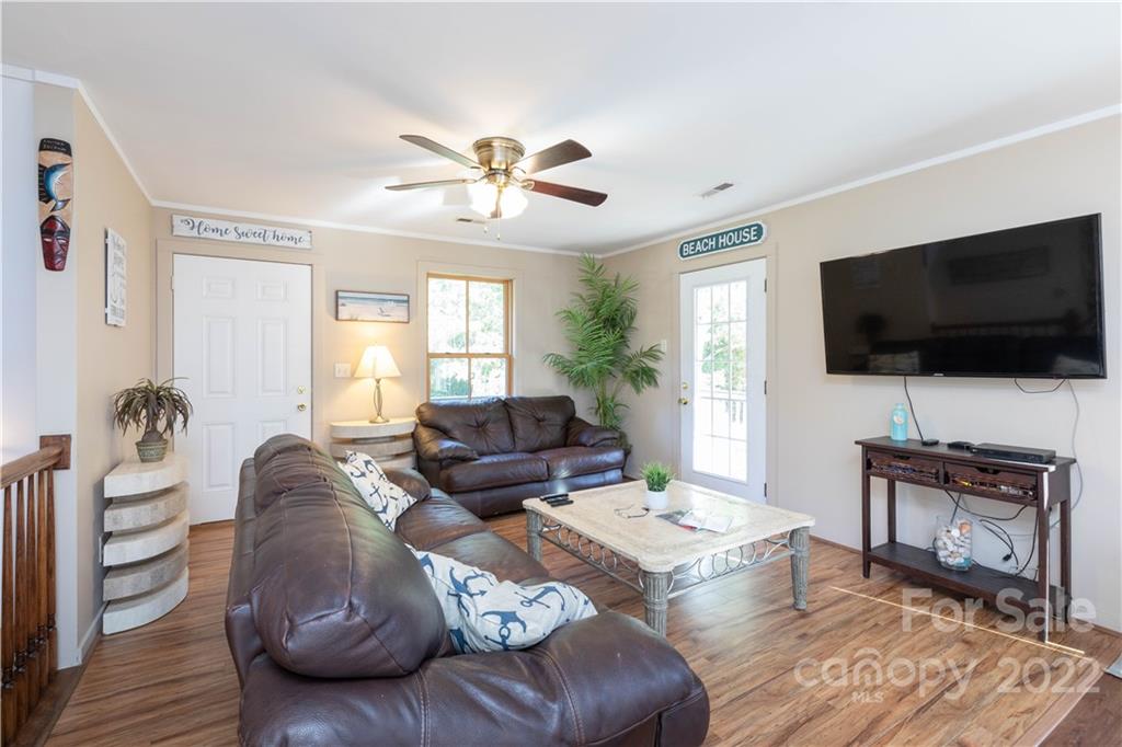 3029 State Highway 55 Clover, SC 29710 - Photo 13 of 34 a living room with furniture and a flat screen tv