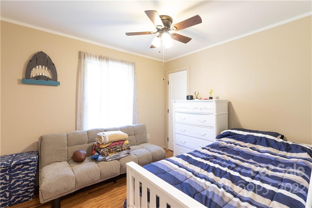 3029 State Highway 55 Clover, SC 29710 - Photo 16 of 34 a bedroom with a bed and a couch