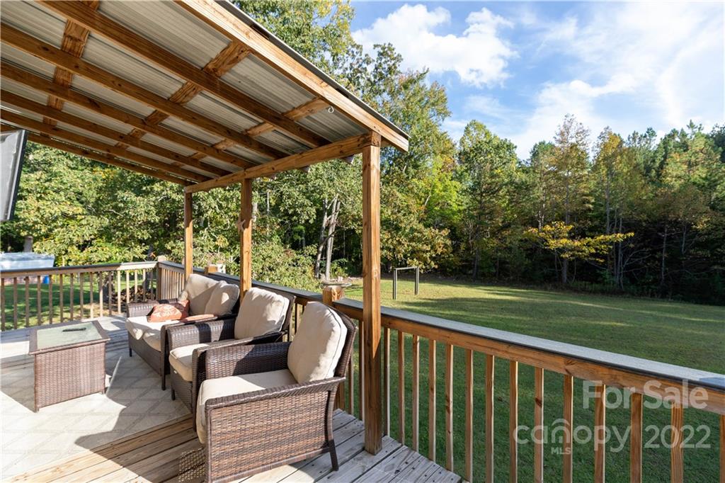 3029 State Highway 55 Clover, SC 29710 - Photo 20 of 34 a view of yard from deck with patio