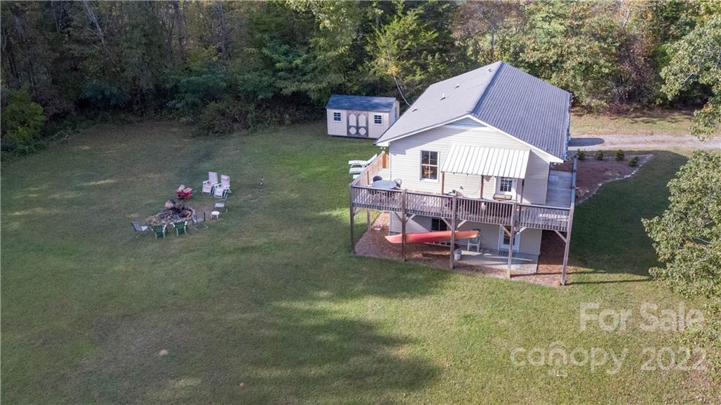 3029 State Highway 55 Clover, SC 29710 - Photo 25 of 34 a aerial view of a house with table and chairs