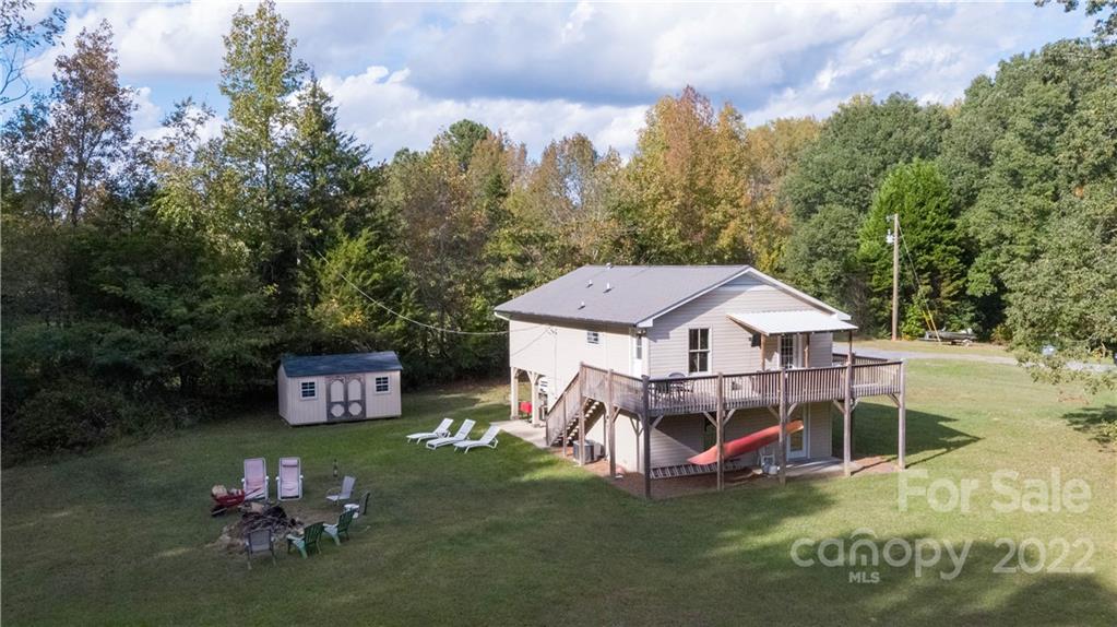 3029 State Highway 55 Clover, SC 29710 - Photo 29 of 34 a view of a house with a yard porch and sitting area