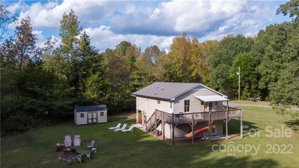 3029 State Highway 55 Clover, SC 29710 - Photo 30 of 34 a aerial view of a house with a big yard