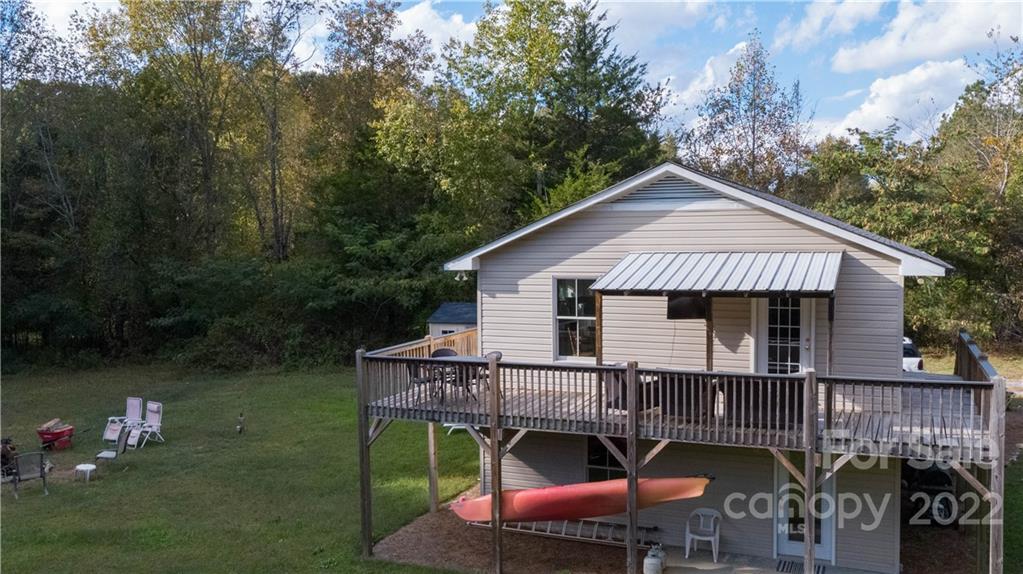 3029 State Highway 55 Clover, SC 29710 - Photo 32 of 34 a front view of a house with garden