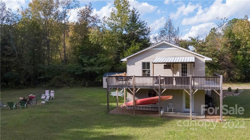 3029 State Highway 55 Clover, SC 29710 - Photo 33 of 34 an aerial view of a house with swimming pool and sitting area