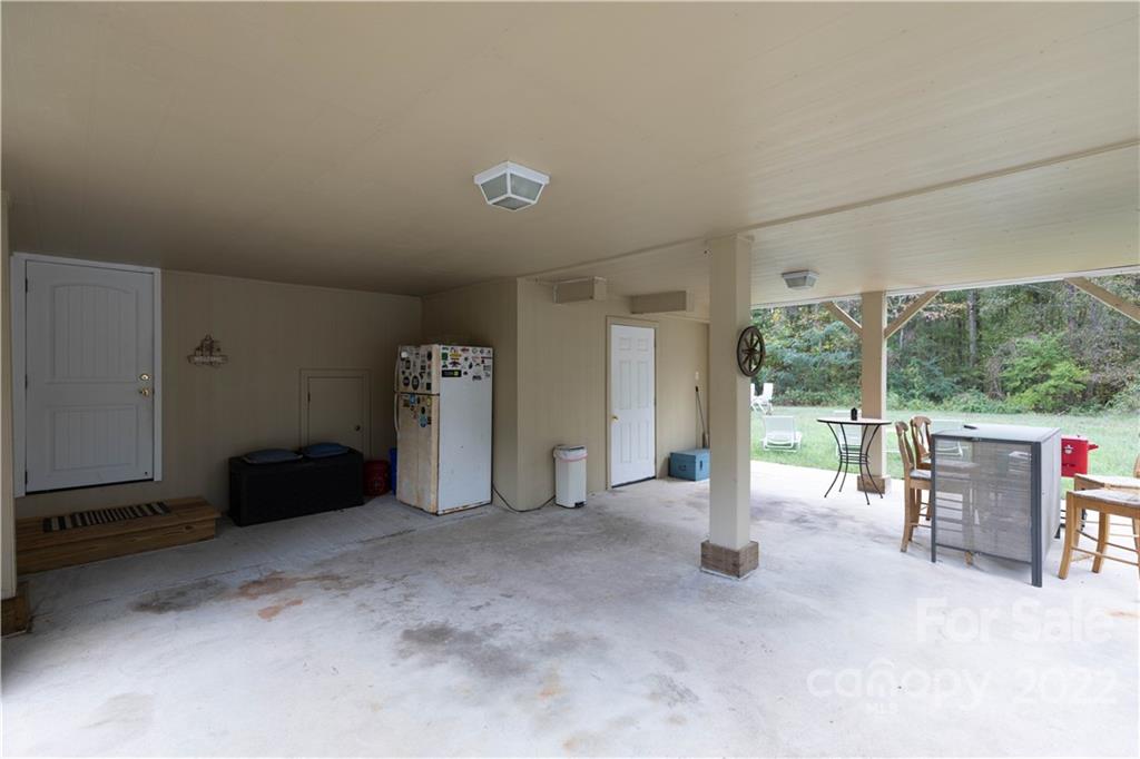 3029 State Highway 55 Clover, SC 29710 - Photo 6 of 34 a view of a livingroom with furniture and floor to ceiling window