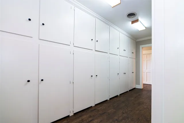 a bathroom with a sink toilet and mirror