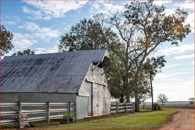 a view of house with yard and entertaining space