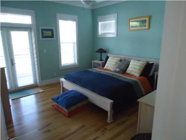 120 Seacrest Beach Blvd Inlet Beach Inlet Beach, FL 32461 - Photo 15 of 31 a bed sitting in a bedroom next to a window