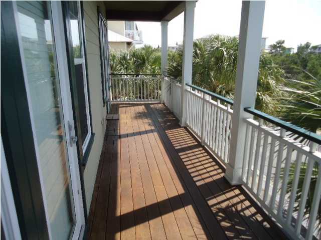120 Seacrest Beach Blvd Inlet Beach Inlet Beach, FL 32461 - Photo 19 of 31 a view of balcony with wooden floor