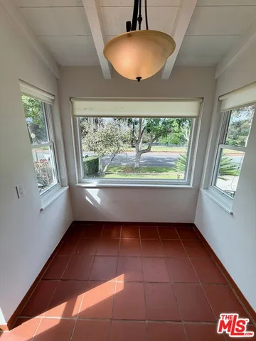 a room with window and a wooden floor