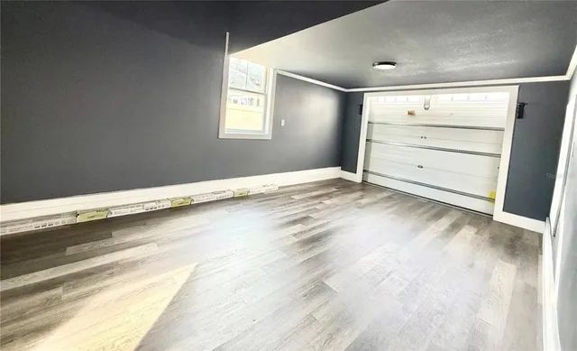 an empty room with windows