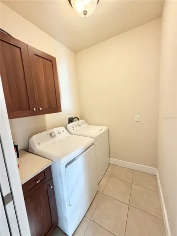 a view of an empty room and a window