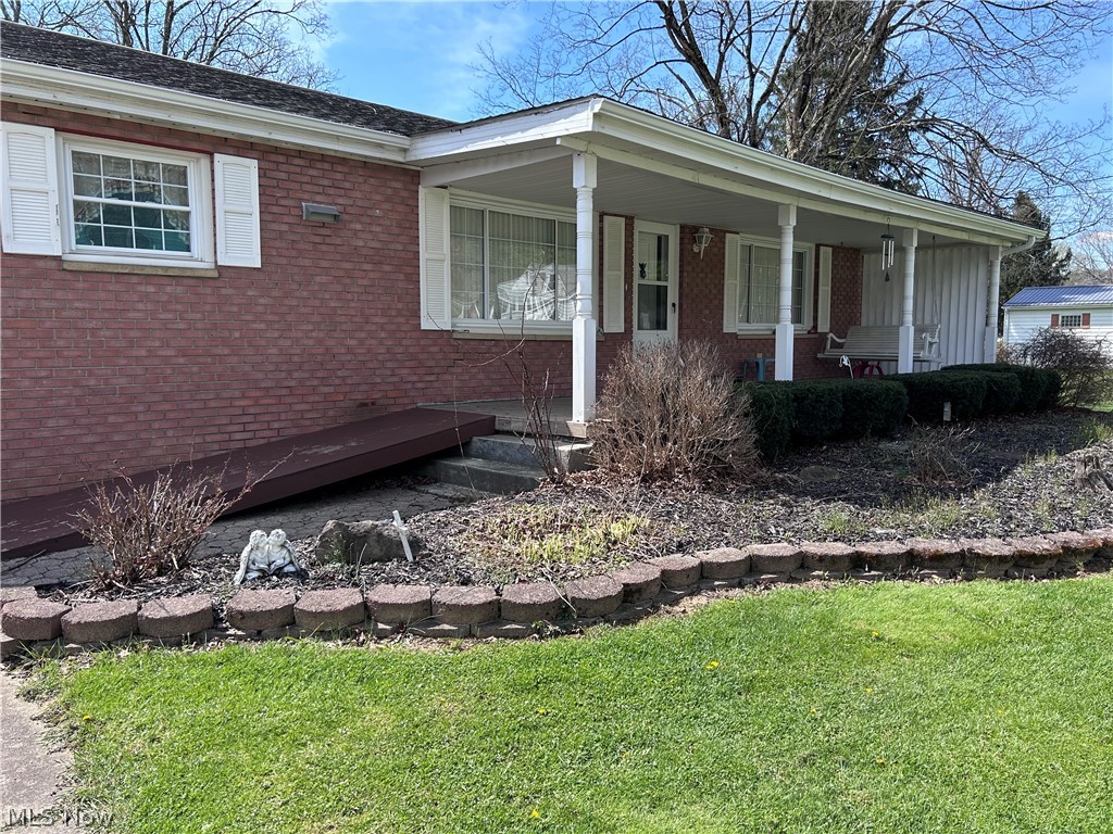 8300 Bear Road Southeast Amsterdam, OH 43903 - Photo 2 of 38 Covered Front Porch