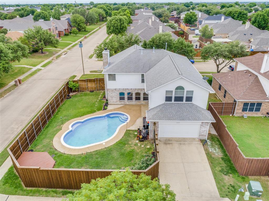 1445 Berkley Road Allen, TX 75002 - Photo 27 of 30 The oversized lot allows for a longer driveway leading to the rear entry garage.