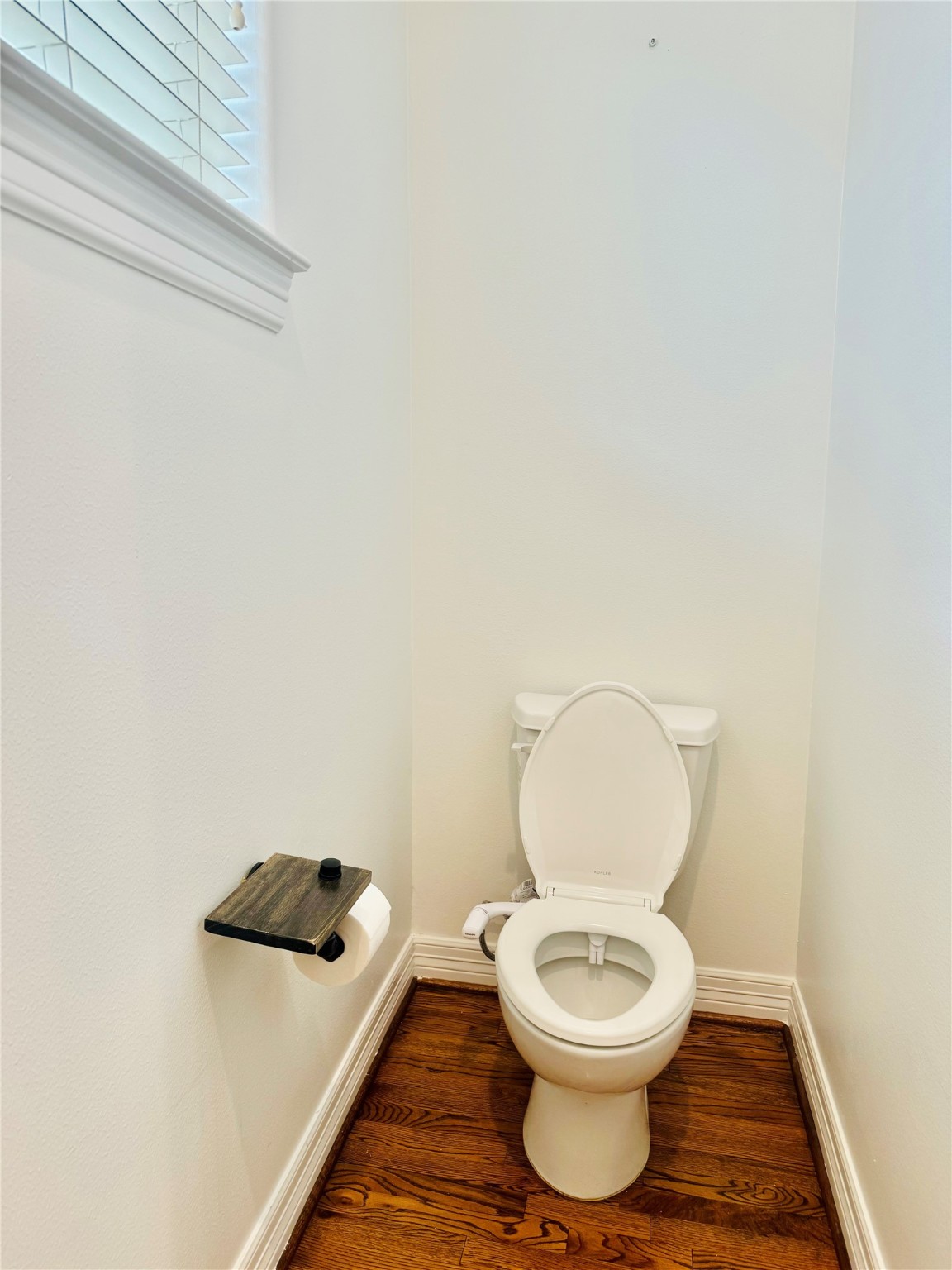 3846 Center Street Houston, TX 77007 - Photo 15 of 37 a white toilet sitting next to a white sink