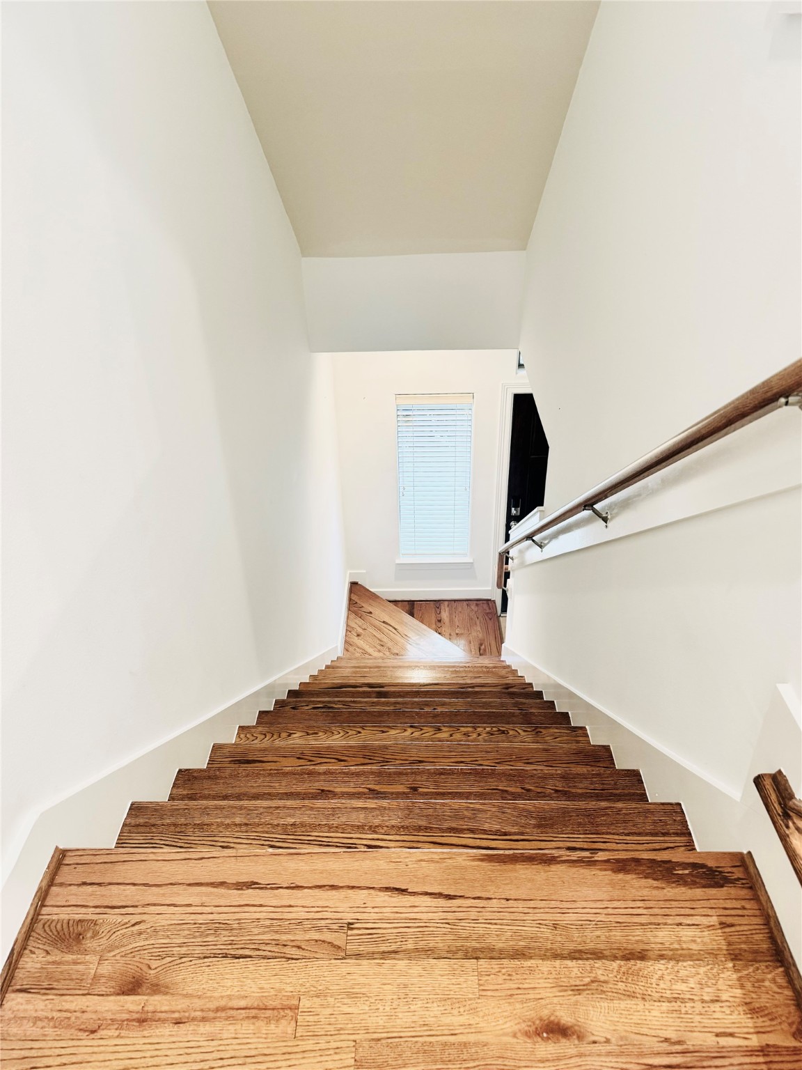 3846 Center Street Houston, TX 77007 - Photo 16 of 37 a bedroom with a bed and a view of bathroom