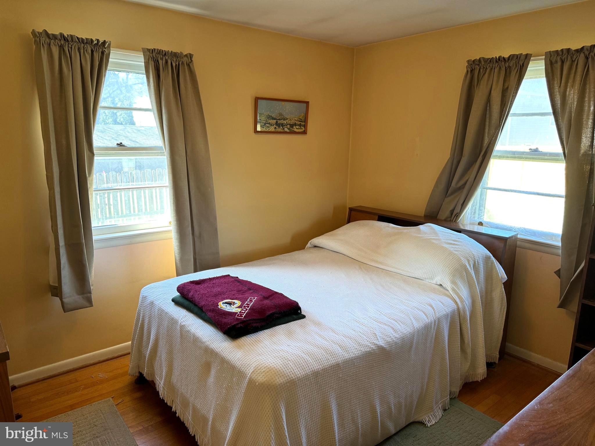 1309 Commerce Street Winchester, VA 22601 - Photo 12 of 27 a bedroom with a bed and a window