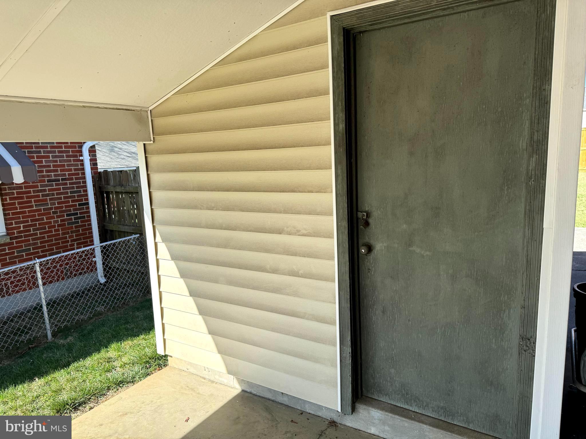 1309 Commerce Street Winchester, VA 22601 - Photo 3 of 27 a view of entryway with wooden walls