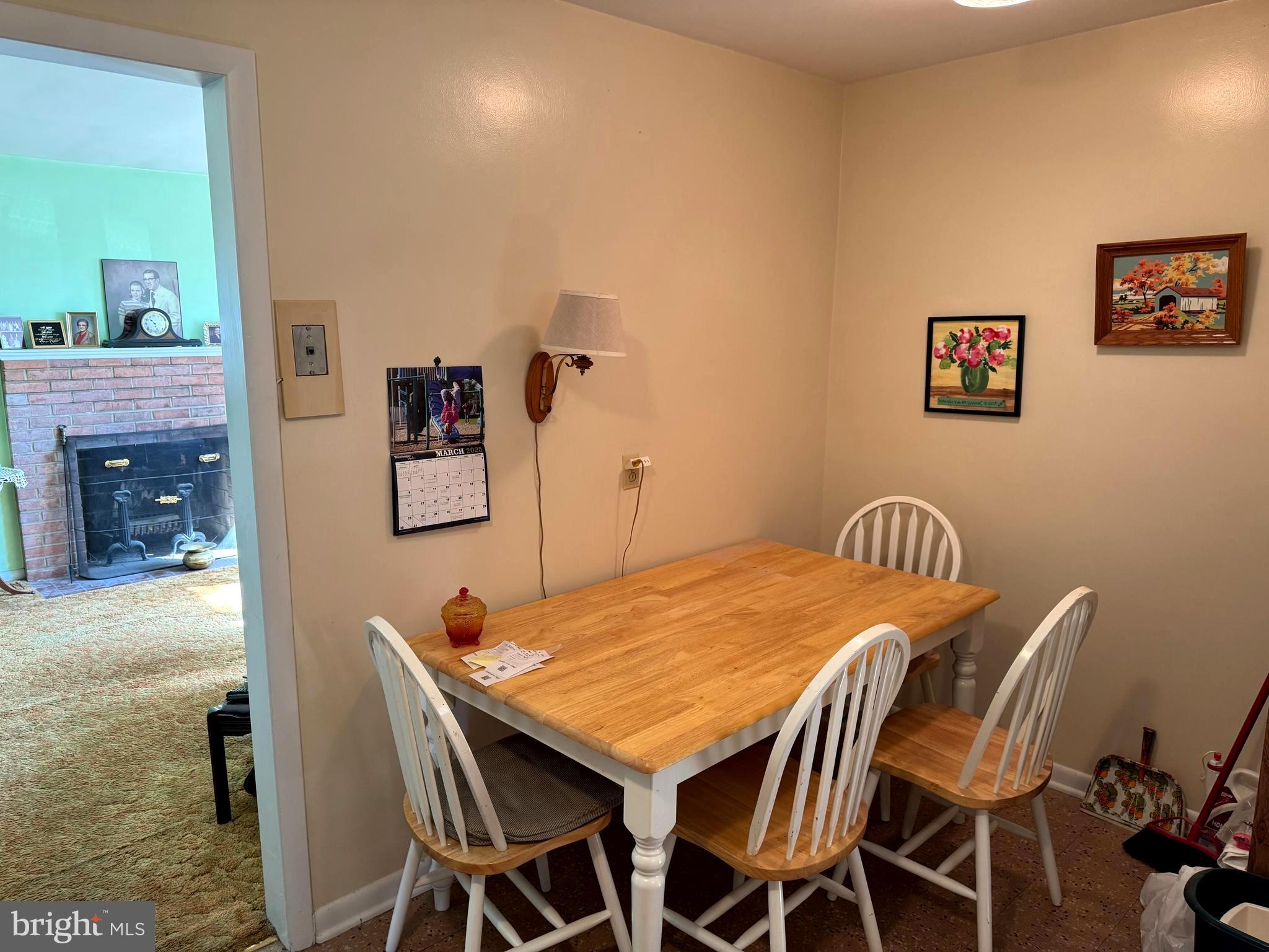 1309 Commerce Street Winchester, VA 22601 - Photo 7 of 27 a dining room with a table and chairs