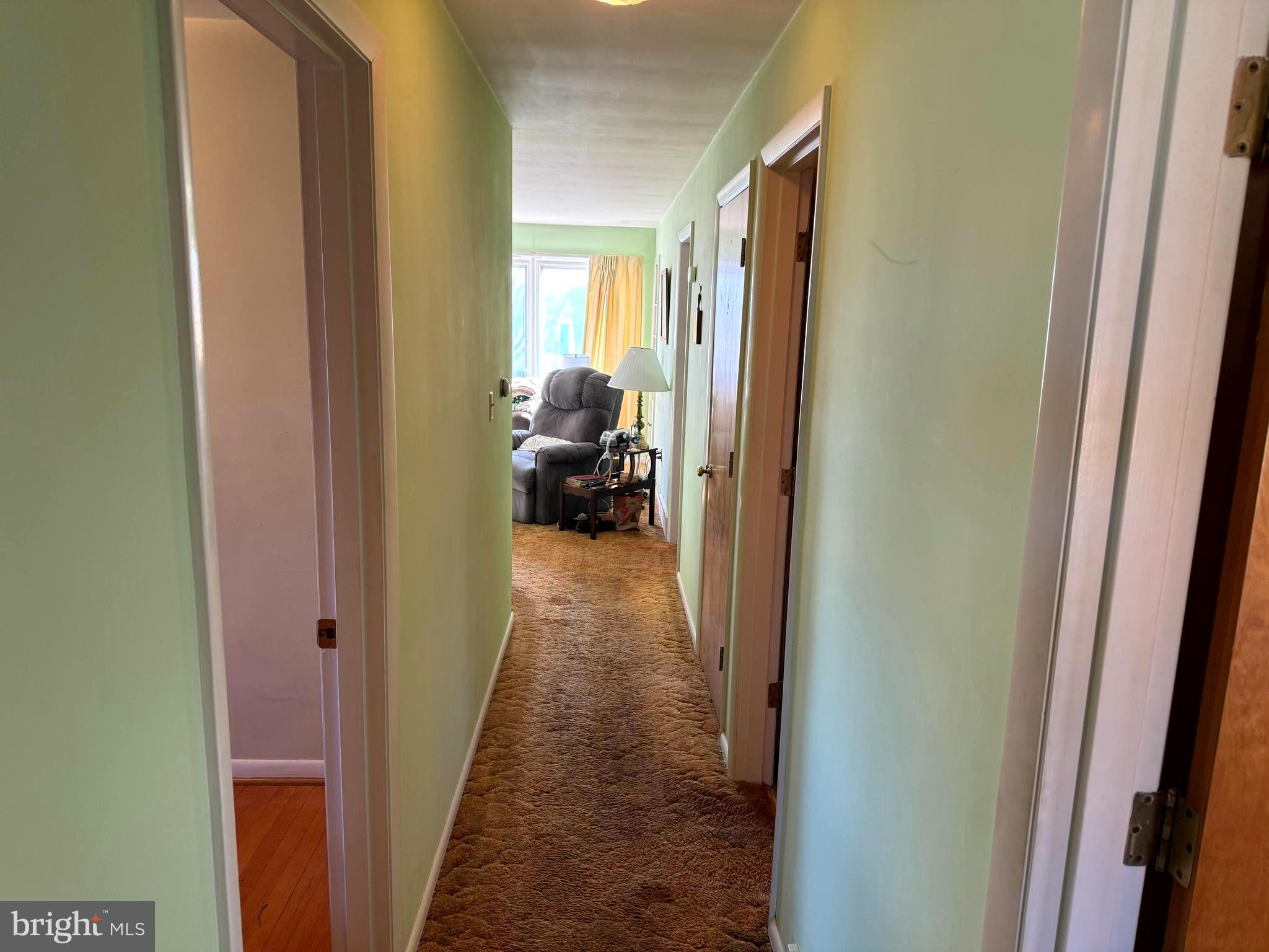 1309 Commerce Street Winchester, VA 22601 - Photo 9 of 27 a view of a livingroom from a hallway