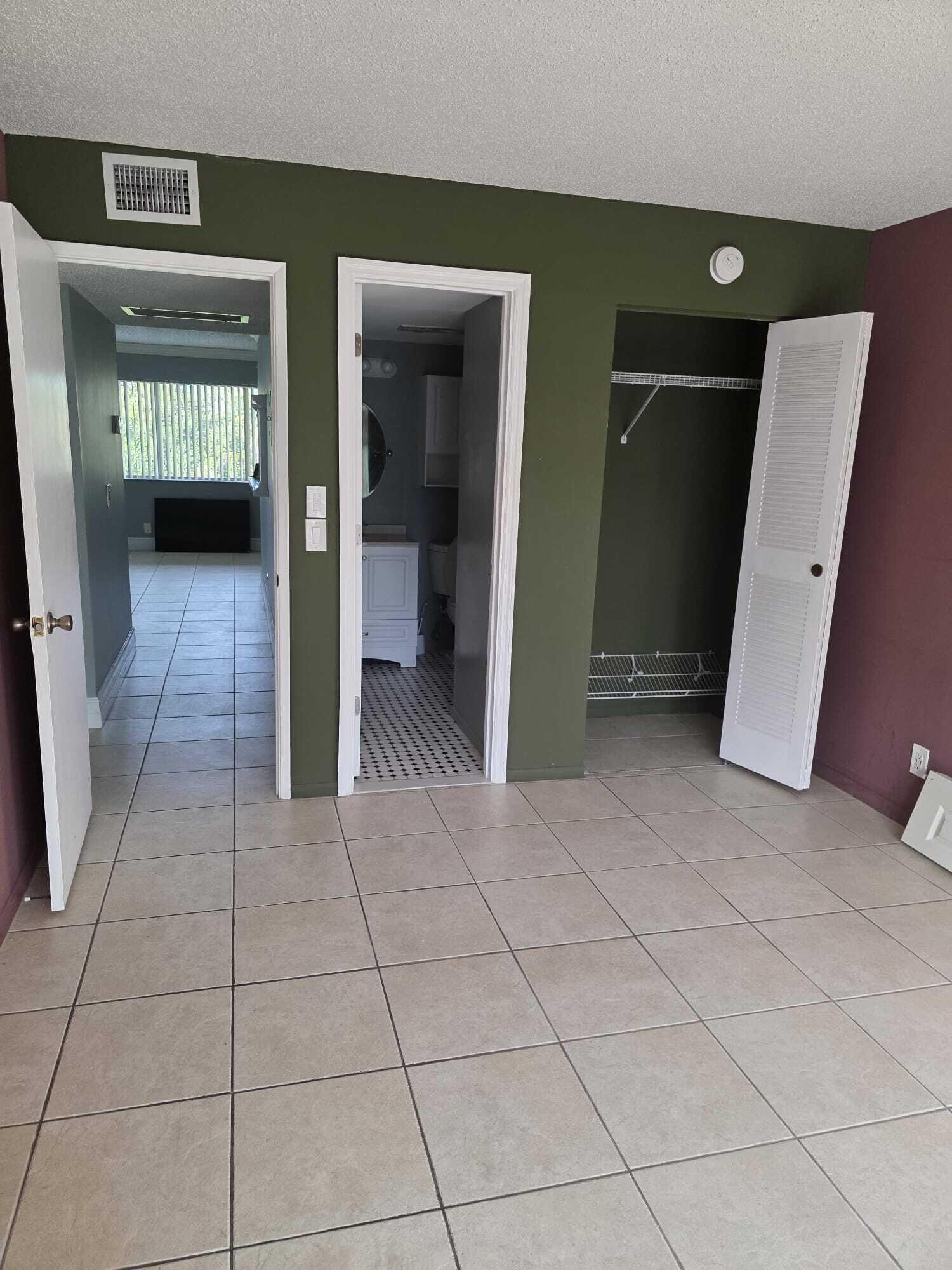 3300 Springdale Boulevard, Unit 318 Palm Springs, FL 33461 - Photo 30 of 34 a view of a furniture in a room