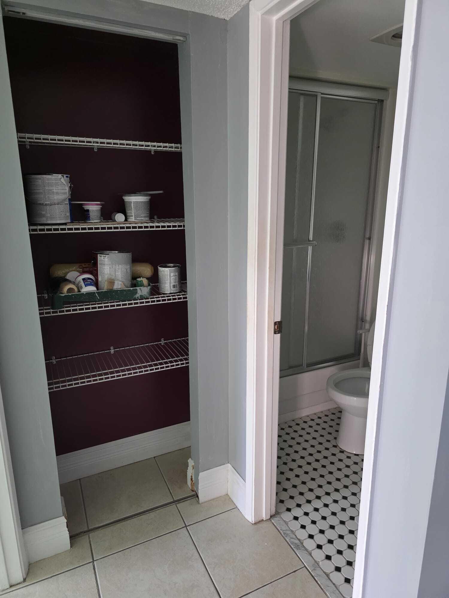 3300 Springdale Boulevard, Unit 318 Palm Springs, FL 33461 - Photo 31 of 34 a bathroom with a glass door